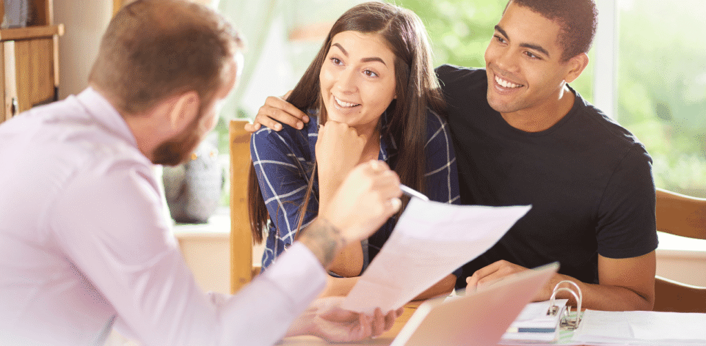 Couple receiving advice from financial expert, illustrating how Seller Edge Capital approaches mortgage and business notes